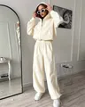Dames vrijetijdspak 2-delig crème met hoodie met rits en wijde joggingbroek voor comfort - Abrikoos