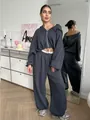 Full view of a charcoal two-piece sweatsuit set with cropped hoodie and wide-leg pants - S / Top And Bottom / Dark Gray