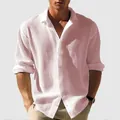Close-up of men's pink waffle knit casual shirt showing fabric texture and fit - Pink