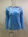 Blue long-sleeved sweater featuring delicate lace floral cutout at the neckline. - Blue