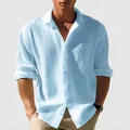 Close-up detail of light blue men's waffle knit long sleeve casual button down shirt - Sky Blue