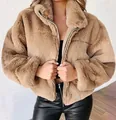 Close-up detail of a warm camel faux fur zip-up jacket with a cozy plush texture - S / Tops / Khaki