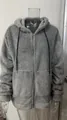 Detailed view of a men's grey plush hooded zip-up jacket showing fuzzy texture - 3XL / Tops / Gray