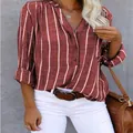 Chic red and white vertical striped women's blouse with button-up V-neck detail - S / Tops / Burgundy
