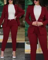 Split detail view showing a stylish women's burgundy professional blazer and trousers suit - S / Top And Bottom / Burgundy