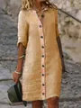 Yellow linen cotton shirt dress with vintage decorative buttons in an outdoor setting - S / Dresses / Khaki