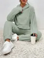 Detailed view showing the plush sherpa fabric of this sage green hooded loungewear set - XS / Top And Bottom / Green