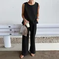 Fashionable black two-piece summer set featuring sleeveless top and loose wide-leg trousers - S / Top And Bottom (Sleeveless) / Black
