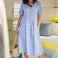 Front view detail of a light blue loose high waist cotton linen dress with buttons. - Light Blue