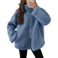 Detailopname van een blauwe oversized teddy fleece jas met rits en hoge kraag - S / Tops / Haze Blauw