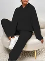 Detailed view of women's black fuzzy sherpa hoodie and matching lounge pants set - XS / Top And Bottom / Black
