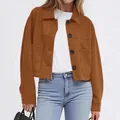 Detailed shot of a stylish brown faux suede short jacket for women in a casual outfit - Tan