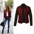 Women's quilted wine red bomber jacket featuring black sleeves and a metallic front zip closure - S / Tops / Burgundy