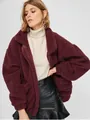 Detailed shot of a burgundy plush teddy jacket featuring a cozy zipper design for women. - S / Tops / Red