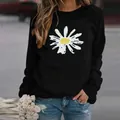 Close-up of women's black crew neck sweatshirt with a white daisy graphic print - S / Tops / Sunflower Black