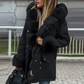 Detailed view of women's black hooded parka with thick faux fur collar and cuffs - S / Tops / Black