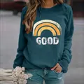 Casual teal crewneck sweatshirt for women featuring a vintage rainbow GOOD print - 3XL / Tops / Rainbow Blue
