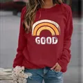 Casual women's burgundy crewneck sweatshirt with rainbow print and GOOD graphic - 3XL / Tops / Rainbow Red