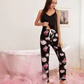 Elegant 2-piece floral pajama set with black camisole and patterned long pants - M / Top And Bottom / Black