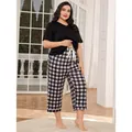 Plus size women's pajama set featuring black t-shirt and heart plaid pants - 0XL / Top And Bottom / Black