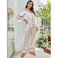 Pink satin ice silk long sleeve pajama set with black piping for women - S / Top And Bottom / Champagne