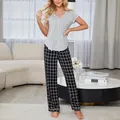 Women's two-piece pajama set featuring a grey short-sleeve top and black checkered pants - S / Top And Bottom / Grey And Black (22008)