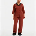 Two-piece women's pajama set in rust color featuring long sleeves and black lapel collar - S / Top And Bottom / Brick Red