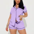 Two-piece women's lavender ribbed pajama set featuring short sleeves with black piping - S / Top And Bottom / Purple