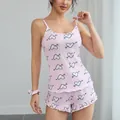 Comfortable pink two-piece pajama set with heart print camisole and ruffle shorts. - S / Top And Bottom / Pink
