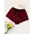 Red and black buffalo plaid pajama shorts for women with a decorative black bow tie - S / Bottoms / Red and Black Grid