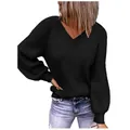 Detail view of a loose-fitting black oversized V-neck knit sweater with ribbing texture - S / Tops / Black