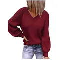 Detail view of women's burgundy V-neck ribbed knit sweater with elegant puff sleeves - S / Tops / Red