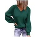 Detail view of a loose dark green knit sweater featuring a stylish V-neck design - S / Tops / Green