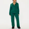 Women's emerald green long sleeve pajama set with black piping and button-down shirt - S / Top And Bottom / Green