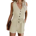 Close-up of a beige V-neck jumpsuit featuring elegant button details and a chic waist bow tie. - Apricot