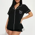 Klassieke tweeledige zwarte damespyjama met witte bies en Sleepy Head borduursel - S / Top en Broek / Zwart