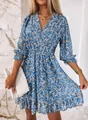 Elegant blue bohemian floral print mini dress with V-neck and cinched waist for women - Blue