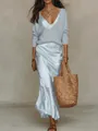 Vue détaillée d'un ensemble élégant avec haut en maille bleu clair et robe en satin. - XS / Haut Et Bas / Bleu clair