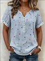 Detalle de una blusa de rayas azules para mujer con estampado de corazones y cuello en V - S / Tops / Azul claro