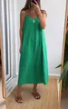 Full-length mirror selfie of a woman wearing a casual loose green summer slip dress - Green