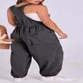 Detailed back view of women's sleeveless dark grey jumpsuit with double layered side pockets - S / Top And Bottom / Gray