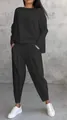 Vue détaillée d'un ensemble femme noir à manches longues avec pantalon à poches. - S / Haut Et Bas / Noir
