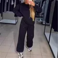 Γυναικείο μαύρο σετ δύο τεμαχίων loungewear με λαμπερά ασημένια στρας σε όλο το σώμα - S / Τοπ Και Παντελόνι / Μαύρο