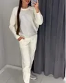 Full view of women's white two-piece tracksuit with sparkling rhinestone panel - 2XL / Top And Bottom / White
