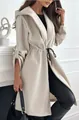 Detail showing the drawstring waist and textured fabric of the beige hooded coat - S / Tops / Apricot