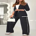 Elegant black women's 2-piece blazer set with sporty white ribbing detail for office wear - XS / Top And Bottom / Black