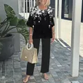 Casual two-piece set with a floral print mid-sleeve top and black trousers for women. - XS / Top And Bottom / Black with White Floral (13)