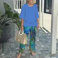 Women's casual two-piece outfit featuring a blue round neck top and floral pants - XS / Top And Bottom / Blue Multicolor Print (15)