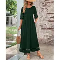 Elegant dark green round neck maxi dress featuring half sleeves and mesh patchwork detailing - S / Tops / Dark Green
