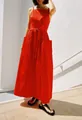 Full-length view of a vibrant red sleeveless maxi dress with waist tie and pockets - S / Tops / Red